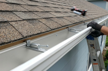 Heavy-duty hidden hangers installed for gutter repair in Grand Blanc MI
