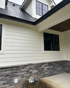 Seamless Gutters Installed Along A Clean Roofline 810-343-5551